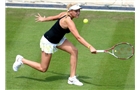 BIRMINGHAM, ENGLAND - JUNE 09:  Donna Vekic of Croatia returns a shot from Belinda Bencic of Switzerland on day one of the AEGON Classic Tennis Tournament at Edgbaston Priory Club on June 9, 2014 in Birmingham, England.  (Photo by Tom Dulat/Getty Images)